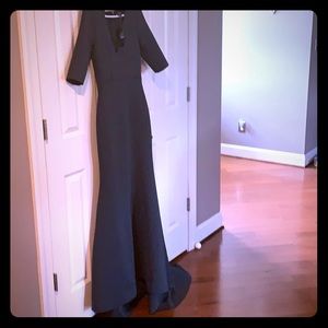 bebe drk green gown tags still on, excellent cond.